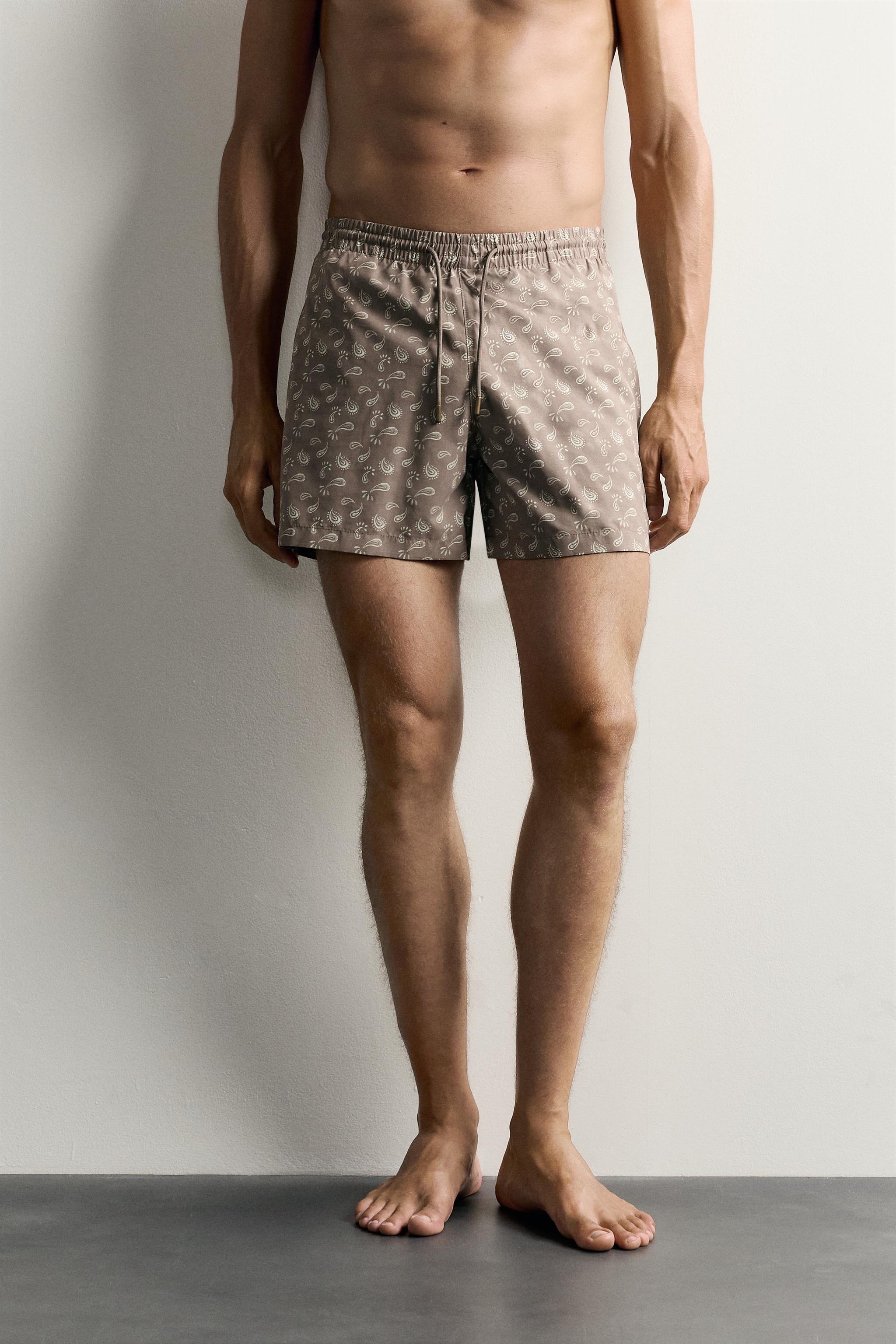 PAISLEY PRINT MID-LENGTH SWIM TRUNKS